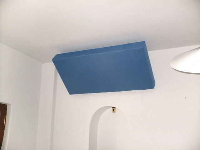 Home made bass traps mounted on wall ceiling junction